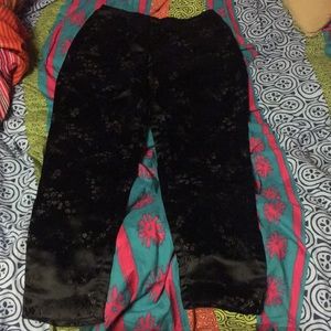 Oriental satin pants.